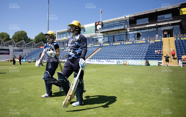 130725 -  Glamorgan Women v Gloucestershire Women, Vitality Blast Women League 2, South Group - Opening batters Bethan Ellis of Glamorgan Women and Lauren Parfitt of Glamorgan Women make their way to the wicket