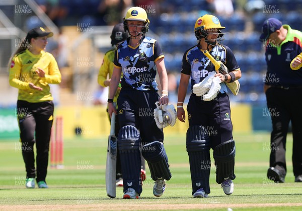 130725 -  Glamorgan Women v Gloucestershire Women, Vitality Blast Women League 2, South Group - Bethan Ellis of Glamorgan Women and Beth Gammon of Glamorgan Women leave the field after their partnership wins the match