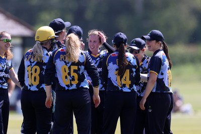 170525 - Glamorgan Women v Lancashire Thunder - T20 Women�s County Cup - Emily Burke of Glamorgan celebrates with team mates after a wicket