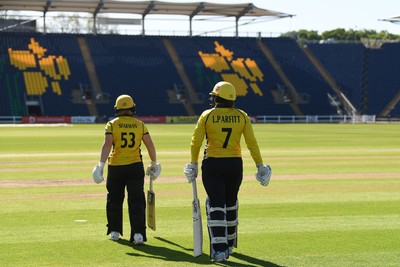190426 - Glamorgan Women v Leicestershire Foxes Women - Metro Bank One Day Cup Women League 2 - Flo Sharman of Glamorgan Women and Lauren Parfitt of Glamorgan Women enter the field of play