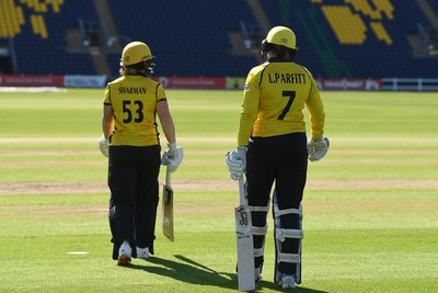 190426 - Glamorgan Women v Leicestershire Foxes Women - Metro Bank One Day Cup Women League 2 - Flo Sharman of Glamorgan Women and Lauren Parfitt of Glamorgan Women enter the field of play
