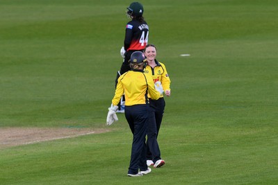 190426 - Glamorgan Women v Leicestershire Foxes Women - Metro Bank One Day Cup Women League 2 - Bethan Gammon of Glamorgan Women celebrates  with team mates after taking the wicket of Becki Brooker of Leicestershire Women