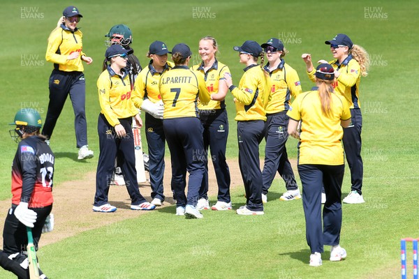 0190426 - Glamorgan Women v Leicestershire Foxes Women - Metro Bank One Day Cup Women League 2 - Anna-Mae Shearn of Glamorgan Women celebrates with team mates after bowling the ball to dismiss Prisha Thanawala of Leicestershire Women