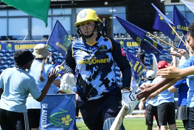 030726 - Glamorgan Women v Middlesex Women - Vitality Blast Women League 2 - Lauren Parfitt of Glamorgan Women runs out at the start of the match