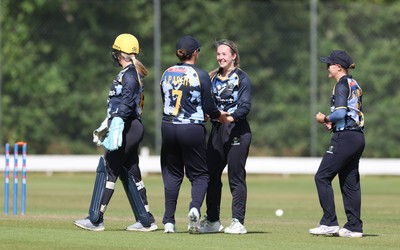 270625  Glamorgan Women v Sussex Sharks, Vitality Blast Women League Two South - Glamorgan celebrate after Rachel King of Sussex Sharks is bowled by Poppy Walker of Glamorgan Women