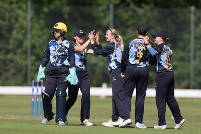 270625  Glamorgan Women v Sussex Sharks, Vitality Blast Women League Two South - Glamorgan celebrate after Rachel King of Sussex Sharks is bowled by Poppy Walker of Glamorgan Women