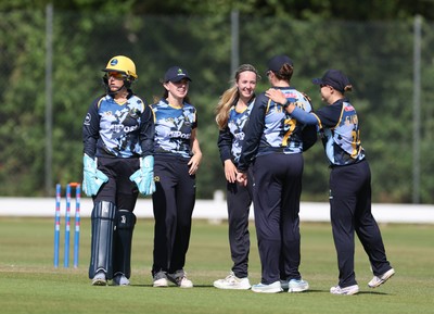 270625  Glamorgan Women v Sussex Sharks, Vitality Blast Women League Two South - Glamorgan celebrate after Rachel King of Sussex Sharks is bowled by Poppy Walker of Glamorgan Women