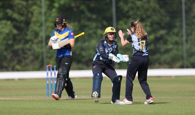 270625  Glamorgan Women v Sussex Sharks, Vitality Blast Women League Two South - Georgia Parfitt of Glamorgan Women and Nicole Reid of Glamorgan Women celebrate as they take the wicket of Mollie Adams of Sussex Sharks