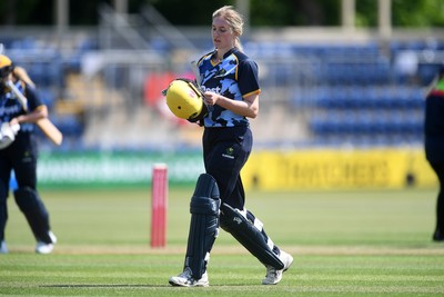 100525 - Glamorgan Women v Sussex Sharks Women, T20 Vitality Blast Women’s County Cup - Charlotte Scarborough of Glamorgan Women is bowled out by Chiara Green of Sussex Women