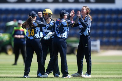 100525 - Glamorgan Women v Sussex Sharks Women, T20 Vitality Blast Women’s County Cup - Phoebe Wilkinson of Sussex Women is bowled out by Katy Cobb of Glamorgan Women