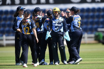 100525 - Glamorgan Women v Sussex Sharks Women, T20 Vitality Blast Women’s County Cup - Emily Burke of Glamorgan Women bowls the ball to dismiss Lucy Western of Sussex Women
