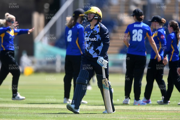 100525 - Glamorgan Women v Sussex Sharks Women, T20 Vitality Blast Women’s County Cup - Lauren Parfitt of Glamorgan Women is bowled out by Eve O’Neill of Sussex Women