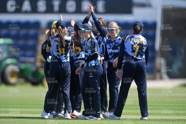100525 - Glamorgan Women v Sussex Sharks Women, T20 Vitality Blast Women’s County Cup - Phoebe Wilkinson of Sussex Women is bowled out by Katy Cobb of Glamorgan Women