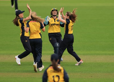 190425 - Glamorgan Women v Sussex Sharks, Metro Bank One Day Cup - Nicole Reid of Glamorgan Women celebrates with team mates after Chiara Green of Sussex Sharks is run out