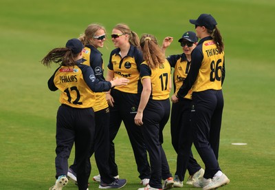 190425 - Glamorgan Women v Sussex Sharks, Metro Bank One Day Cup - Daisy Jeanes of Glamorgan Women celebrates with team mates after she catches Talitha Stanley of Sussex Sharks