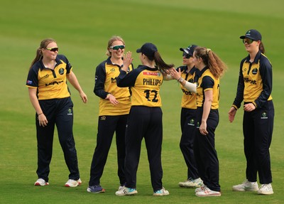 190425 - Glamorgan Women v Sussex Sharks, Metro Bank One Day Cup - Daisy Jeanes of Glamorgan Women celebrates with team mates after she catches Talitha Stanley of Sussex Sharks