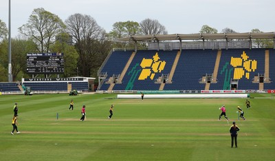190425 - Glamorgan Women v Sussex Sharks, Metro Bank One Day Cup - Poppy Tulloch of Glamorgan Women bowls Daisy Gibb of Sussex Sharks