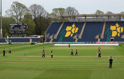 190425 - Glamorgan Women v Sussex Sharks, Metro Bank One Day Cup - Poppy Tulloch of Glamorgan Women bowls Daisy Gibb of Sussex Sharks