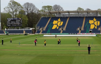 190425 - Glamorgan Women v Sussex Sharks, Metro Bank One Day Cup - Poppy Tulloch of Glamorgan Women bowls Daisy Gibb of Sussex Sharks