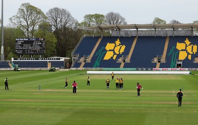 190425 - Glamorgan Women v Sussex Sharks, Metro Bank One Day Cup - Poppy Tulloch of Glamorgan Women bowls Daisy Gibb of Sussex Sharks