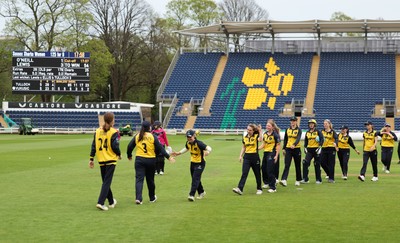 190425 - Glamorgan Women v Sussex Sharks, Metro Bank One Day Cup - Glamorgan Women players leave the pitch at the end of the match after their historic win over Sussex Sharks