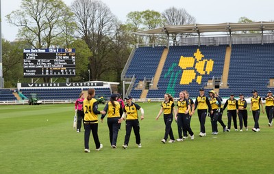 190425 - Glamorgan Women v Sussex Sharks, Metro Bank One Day Cup - Glamorgan Women players leave the pitch at the end of the match after their historic win over Sussex Sharks