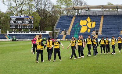 190425 - Glamorgan Women v Sussex Sharks, Metro Bank One Day Cup - Glamorgan Women players leave the pitch at the end of the match after their historic win over Sussex Sharks