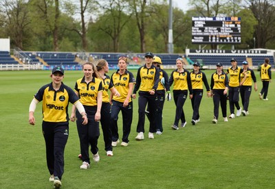 190425 - Glamorgan Women v Sussex Sharks, Metro Bank One Day Cup - Glamorgan Women players leave the pitch at the end of the match after their historic win over Sussex Sharks
