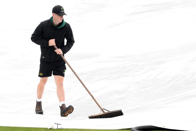 190425 - Glamorgan Women v Sussex Women - Metro Bank One Day Cup - The Groundsmen prepare to clear the field so play can start