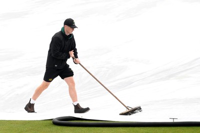 190425 - Glamorgan Women v Sussex Women - Metro Bank One Day Cup - The Groundsmen prepare to clear the field so play can start