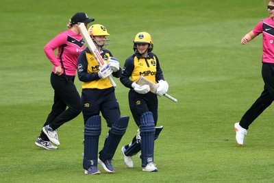 190425 - Glamorgan Women v Sussex Women - Metro Bank One Day Cup - Daisy Jeanes and Bea Ellis of Glamorgan Women enter the pitch for the first time