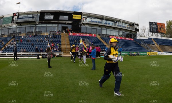190425 - Glamorgan Women v Sussex Sharks, Metro Bank One Day Cup - Daisy Jeanes of Glamorgan Women runs out as she and Bea Ellis of Glamorgan Women open the batting for Glamorgan Women’s first match