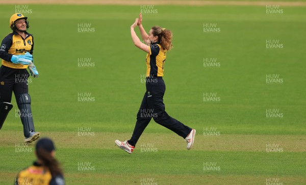 190425 - Glamorgan Women v Sussex Sharks, Metro Bank One Day Cup - Nicole Reid of Glamorgan Women celebrates with team mates after Chiara Green of Sussex Sharks is run out