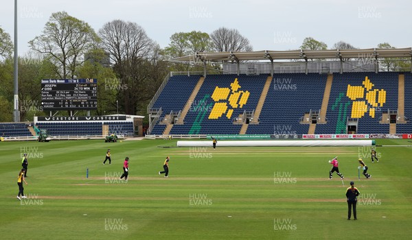 190425 - Glamorgan Women v Sussex Sharks, Metro Bank One Day Cup - Poppy Tulloch of Glamorgan Women bowls Daisy Gibb of Sussex Sharks