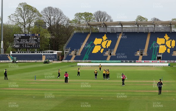 190425 - Glamorgan Women v Sussex Sharks, Metro Bank One Day Cup - Poppy Tulloch of Glamorgan Women bowls Daisy Gibb of Sussex Sharks