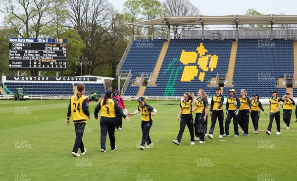 190425 - Glamorgan Women v Sussex Sharks, Metro Bank One Day Cup - Glamorgan Women players leave the pitch at the end of the match after their historic win over Sussex Sharks