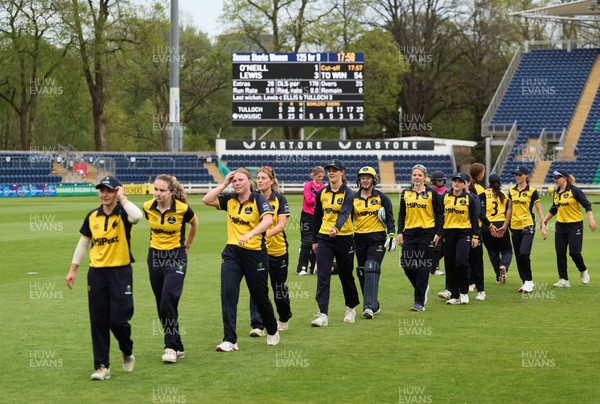190425 - Glamorgan Women v Sussex Sharks, Metro Bank One Day Cup - Glamorgan Women players leave the pitch at the end of the match after their historic win over Sussex Sharks