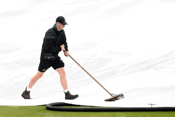 190425 - Glamorgan Women v Sussex Women - Metro Bank One Day Cup - The Groundsmen prepare to clear the field so play can start