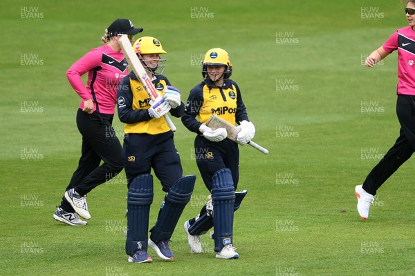 190425 - Glamorgan Women v Sussex Women - Metro Bank One Day Cup - Daisy Jeanes and Bea Ellis of Glamorgan Women enter the pitch for the first time