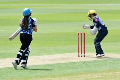 050726 - Glamorgan Women v Worcestershire Rapids Women - Vitality Blast Women League 2 - Lucy Harris of Worcestershire is run out by Bethan Gammon and Megan Sturge of Glamorgan Women