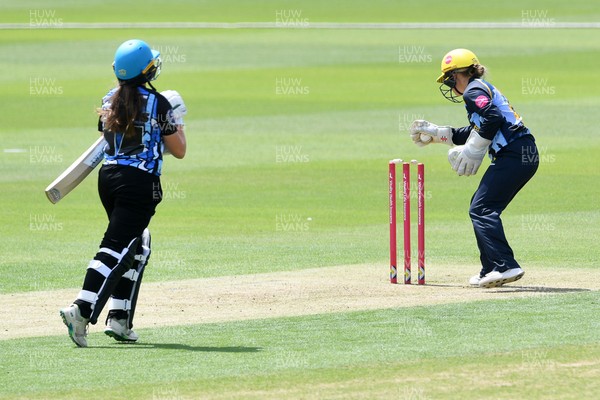 050726 - Glamorgan Women v Worcestershire Rapids Women - Vitality Blast Women League 2 - Lucy Harris of Worcestershire is run out by Bethan Gammon and Megan Sturge of Glamorgan Women