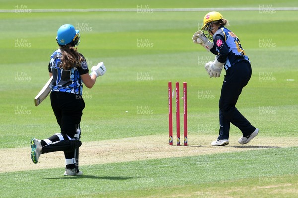 050726 - Glamorgan Women v Worcestershire Rapids Women - Vitality Blast Women League 2 - Lucy Harris of Worcestershire is run out by Bethan Gammon and Megan Sturge of Glamorgan Women