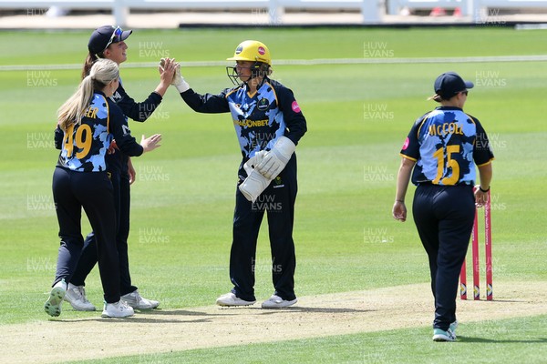 050726 - Glamorgan Women v Worcestershire Rapids Women - Vitality Blast Women League 2 - Lucy Harris of Worcestershire is run out by Bethan Gammon and Megan Sturge of Glamorgan Women