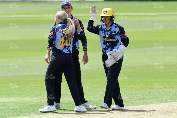 050726 - Glamorgan Women v Worcestershire Rapids Women - Vitality Blast Women League 2 - Lucy Harris of Worcestershire is run out by Bethan Gammon and Megan Sturge of Glamorgan Women
