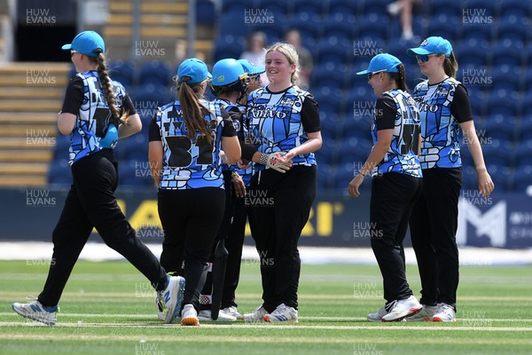 050726 - Glamorgan Women v Worcestershire Rapids Women - Vitality Blast Women League 2 - Amy Griffiths of Worcestershire celebrates with team mates after Megan Sturge of Glamorgan Women is LBW