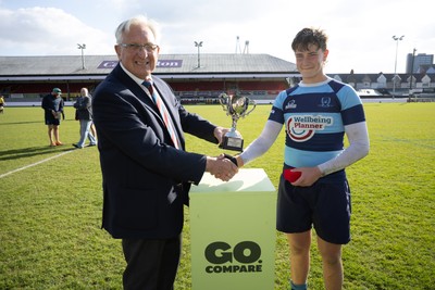 280426 - Glantaf v Y Pant, Boys Year 9 Final - Glantaf captain Will Evans receives the trophy from Roy Bergiers after they win the Boys Year 9 Final