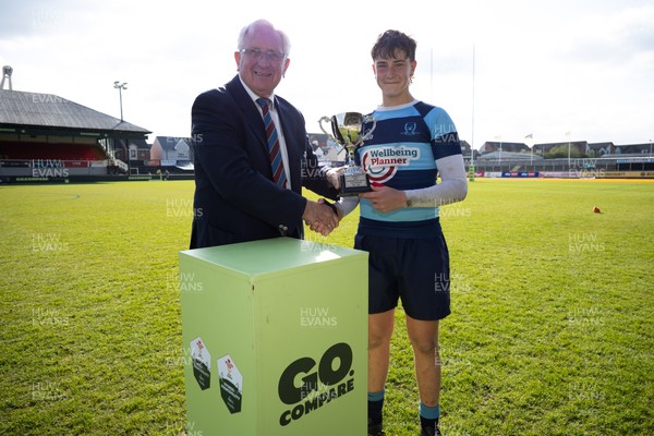 280426 - Glantaf v Y Pant, Boys Year 9 Final - Glantaf captain Will Evans receives the trophy from Roy Bergiers after they win the Boys Year 9 Final