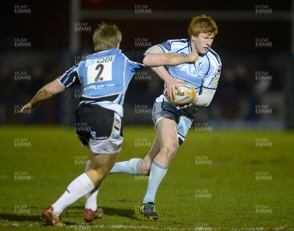 010313 - Glasgow v Cardiff Blues - RaboDirect PRO12 - Cardiff's Rhys Patchell takes on Warriors' Pat MacArthur