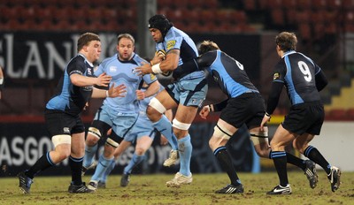 19.02.10 - Glasgow v Cardiff Blues - Magners League - Maama Molitika of Cardiff Blues takes on Moray Low and Richie Vernon of Glasgow. 