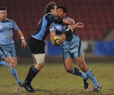 19.02.10 - Glasgow v Cardiff Blues - Magners League - Casey Laulala of Cardiff Blues is tackled by Ruaridh Jackson of Glasgow. 